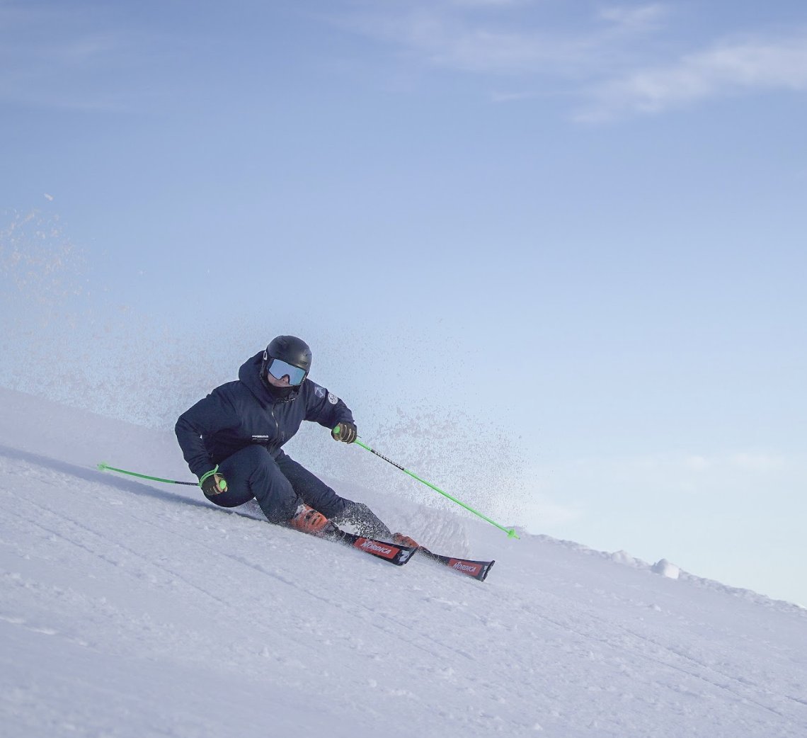 Skier enjoying a lesson on fresh snow